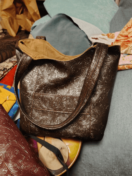 Medium brown and dark brown leatherette.